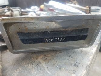 C10 badge and ashtray