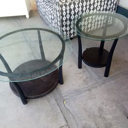 Two glass tables