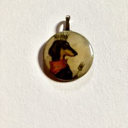 For the dachshund lover…clever piece to warm your heart.    Add to any chain you have.   Back of charm is a quarter.