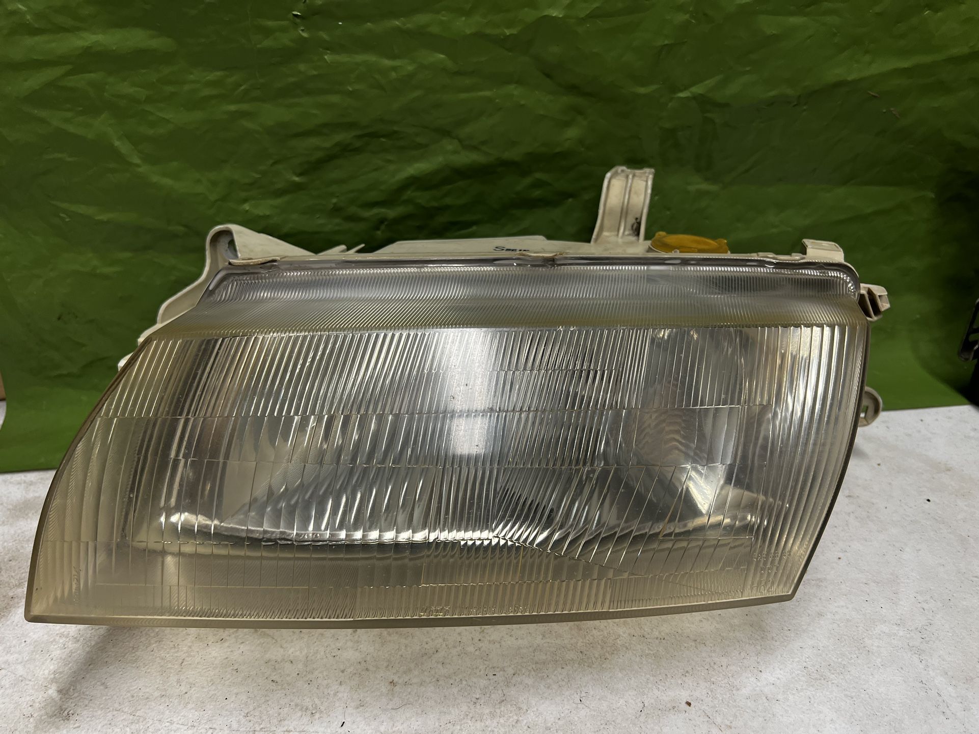 97 - 98 Mazda Prtotege Headlight Headlamp Assembly Driver Side