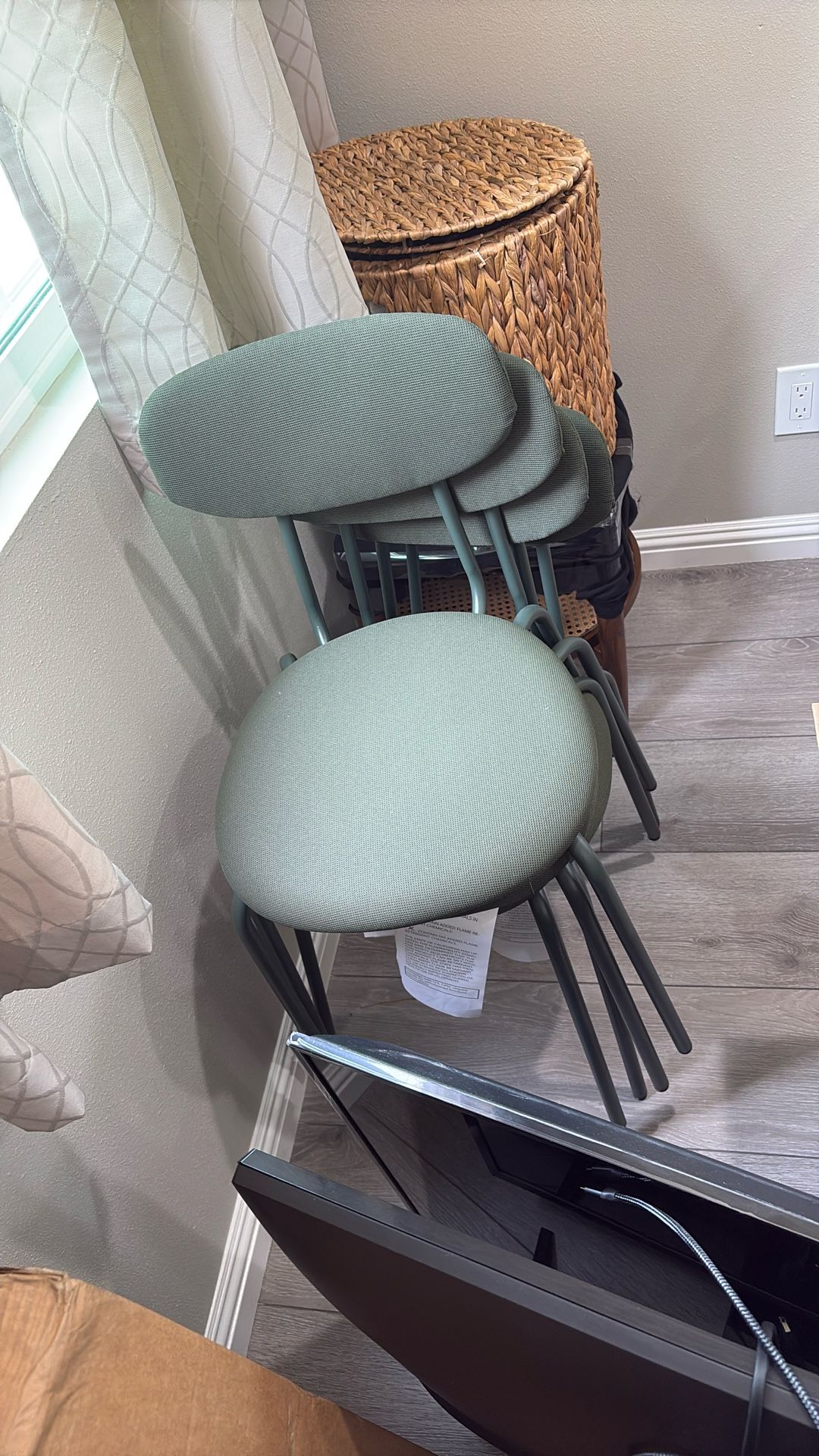 Four green kitchen table chairs