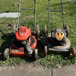 FREE Lawnmowers. Unsure of working condition. Great for parts.