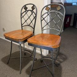 Two Rotating Tall Chairs