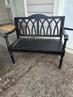 Outdoor black wood distressed bench