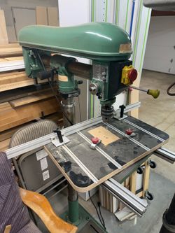 General radial head drill press