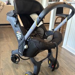 DOONA Infant Car Seat Nitro Black Stroller Car Seat - Comes with  LATCH BASE