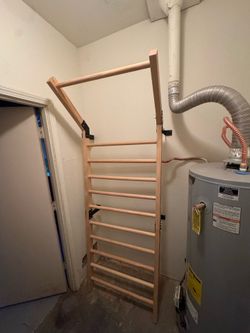 Mountable pull up and stretch bars