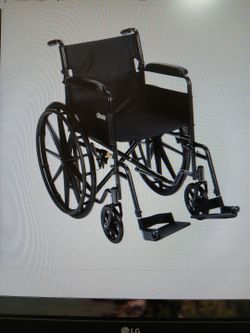 Folding wheel chair with footrests NEW