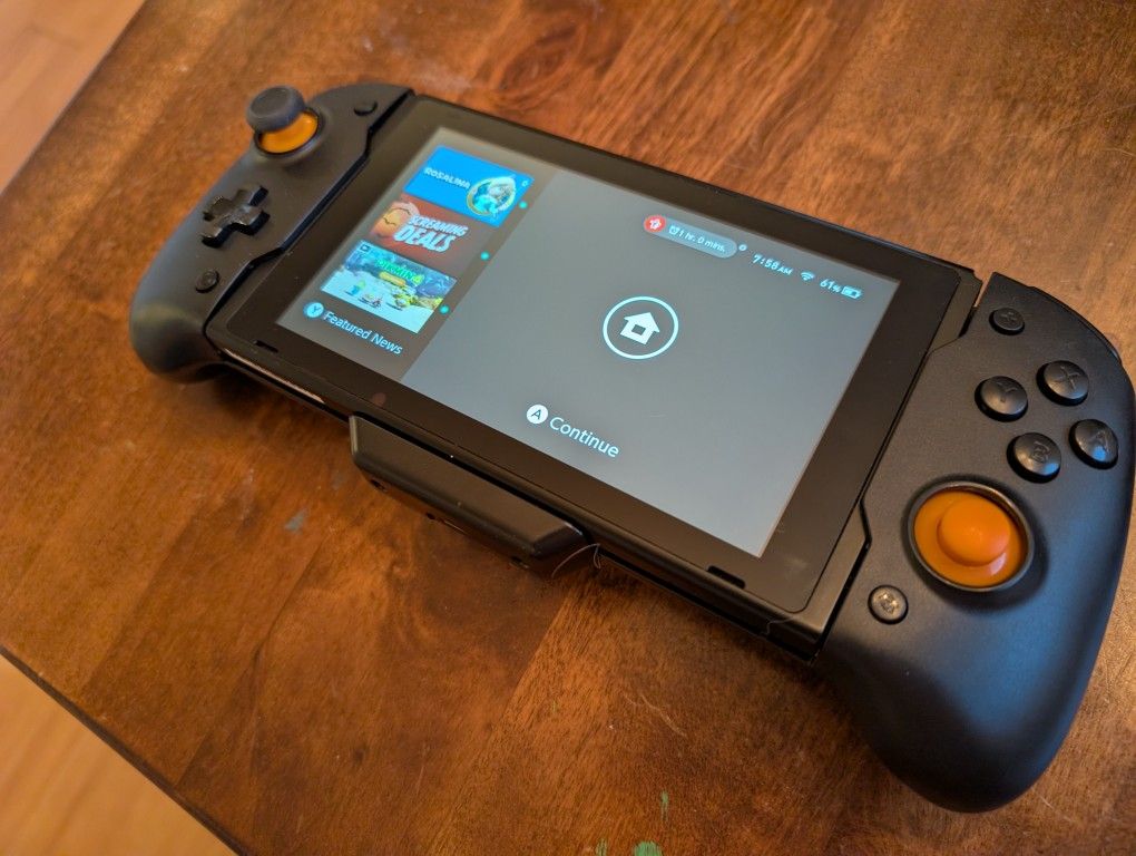 Nintendo Switch 1 with Joy cons And Echzove Grip