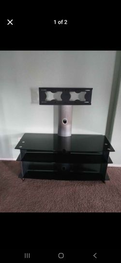 TV stand  48 wide from living  spaces  holds tvs up to 75