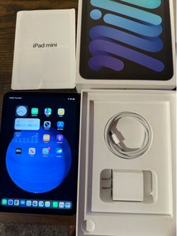 iPad Mini (Gen 6). Practically New. Used sparingly as a calendar.  Complete with super charge power chord.