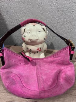 Pink suede coach