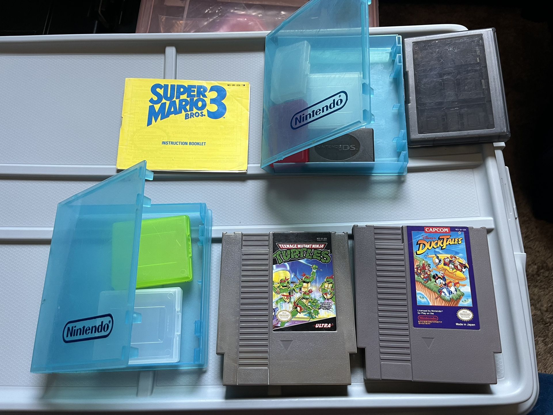 nintendo nes 2 game and various cases combo