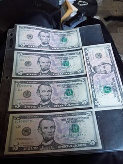 Series 2021 $ 5 doller bills in sequence