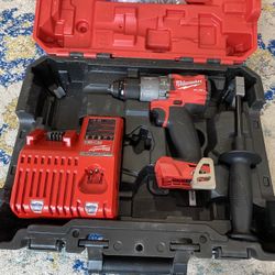 Milwaukee Hammer Drill And Charger