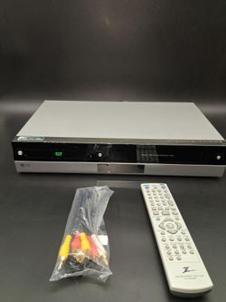 LG ,VCR/DVD Player with remote and cable.  Works fine.