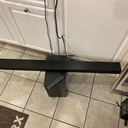 The Samsung HW-R60C/ZA is a 3.1-channel soundbar system with a wireless subwoofer, providing 340W of power designed for clear dialogue and immersive s