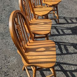 Four Solid Wood swivel stools/chairs 