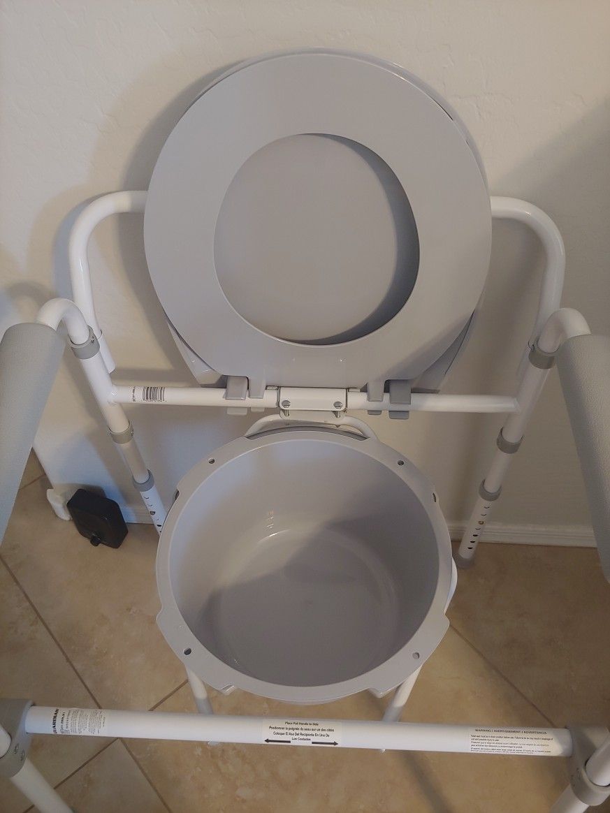 Like New Adjustable Height 3 In 1 Bedside Commode