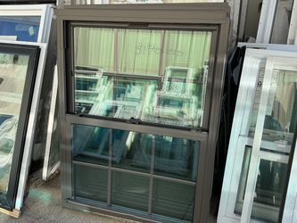 35 x 47 aluminum windows in bronze $170 each 4 available.