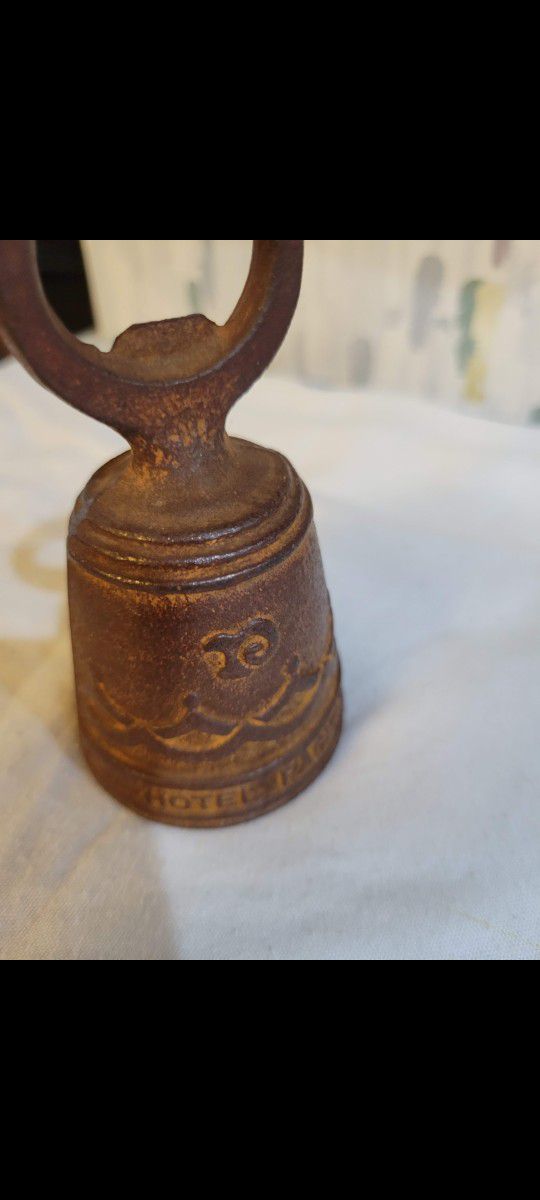 Antique Bell Ringer Bottle Opener