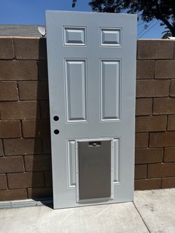 Front door 36”x 80 with dog door 25” x 14”
