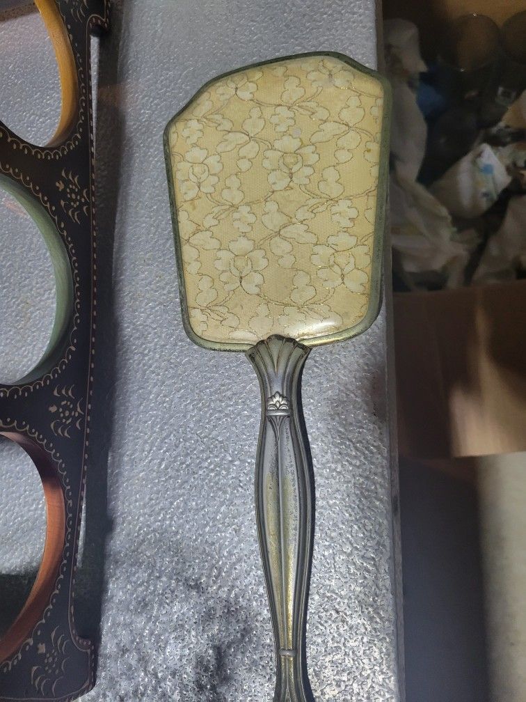 Vintage hand-held vanity mirror 