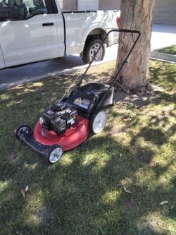 Red Gas-Powered Push Lawn Mower troy bilt