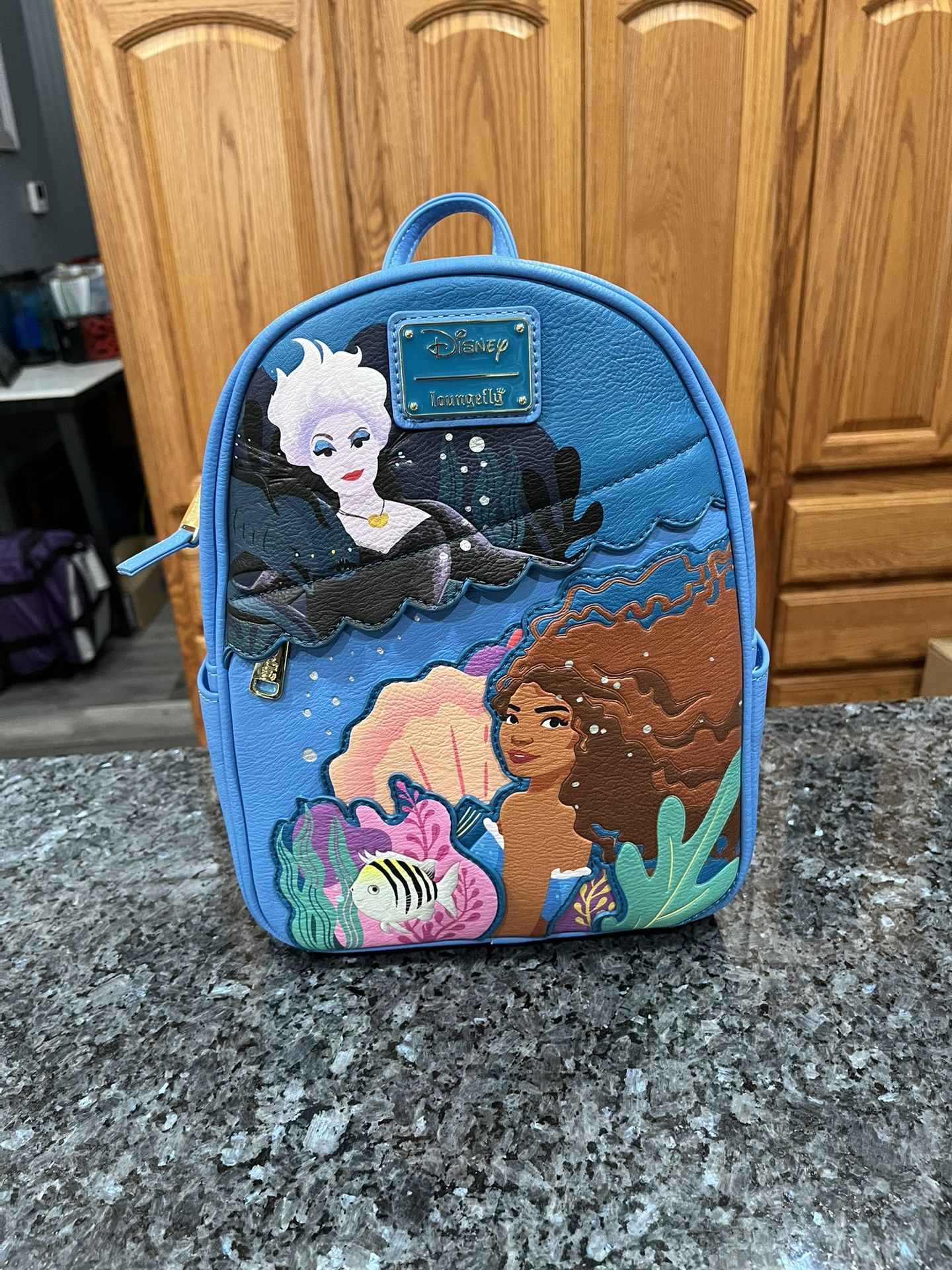 Disney Parks Ariel The Little Mermaid Loungefly Live Action Backpack.  Brand new with tags never used.  Smoke free home  