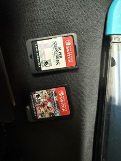 Nintendo Switch Oled With 2 Games