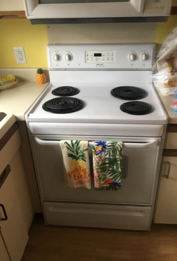 Frigidaire Range and ge dishwasher white