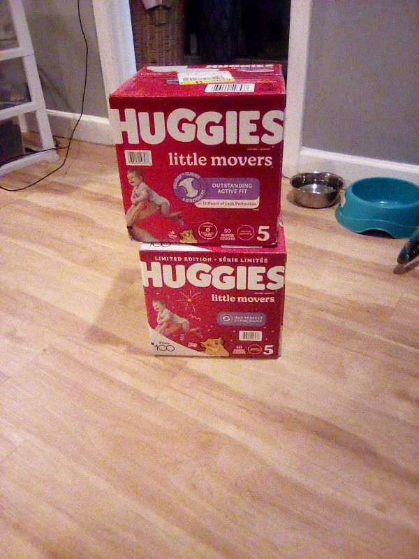 Two Boxes Of Brand New Huggies Diapers Size 5