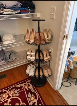 Very sturdy multipurpose display rack, approximately 37 inches tall and in great condition. Perfect for shoes, scarves, accessories, or anything else