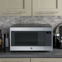 GE 1.6 Cu. Ft. Countertop Microwave Oven gcst16s1w