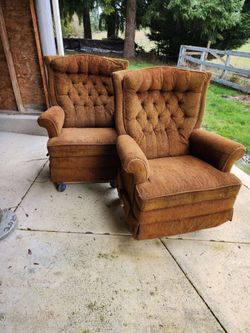 Two lazy boys swivel rocker recliner chairs