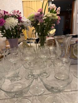 Crystal assorted glasses, wines, champagne, water.