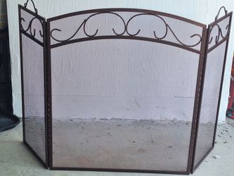 Bronze 3 panel fireplace screen for sale.