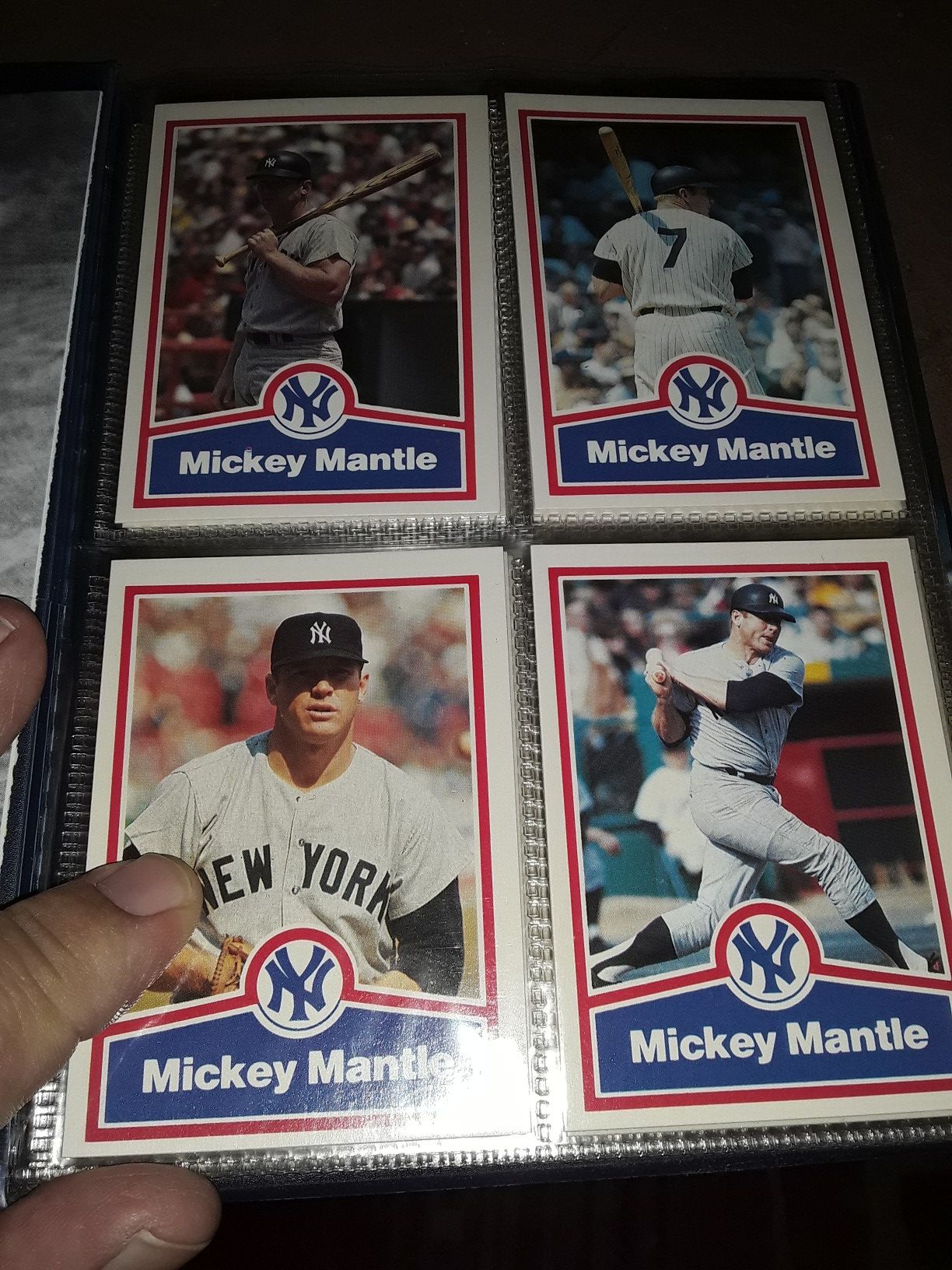 23 different Mickey Mantle baseball cards.