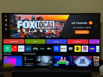 Tv stand with TV and Speakers