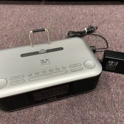 This Ihome Is Compatible With Iphone, Ipad, And Ipod. It Has The Lightening Input So Its Made For Newer Models. It Serves As An Alarm Clock, Speaker, 