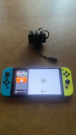 Nintendo Switch with Neon Blue and Yellow Joy-Cons
