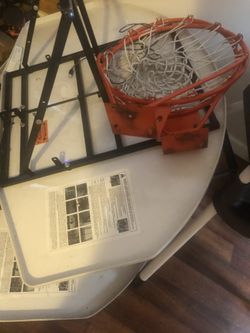 Junior over the backboard rims