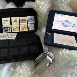 Nintendo 3DS XL galaxy edition with 10 games and case!