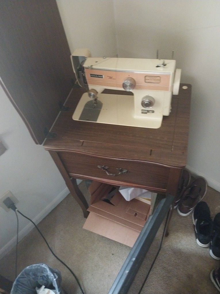 Vintage Sewing Machine And Table