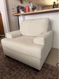 Almost brand new (used for two weeks) armchair from living spaces ivory