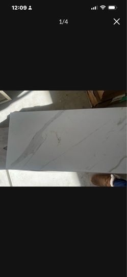 Carrara tile  $250 for all 23 boxes like 58 ft