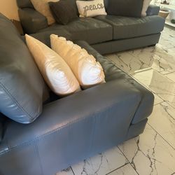 2 dark gray leather Couch