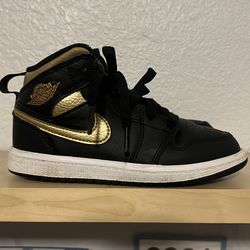 Air Jordan’s 1 black, gold, white