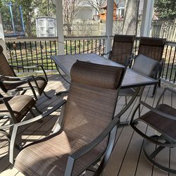 Patio dining set — table + 6 chairs
