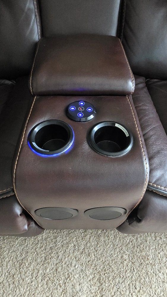 Electric sofa/recliner with night light Bluetooth speakers charging ports and reading light. No pets